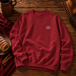 Front of the cherry red sweatshirt with the small Chimney Cake badge on the left chest