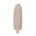 Side view of the Sand sweatshirt showing the dropped shoulder and ribbed cuff