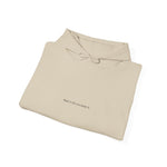 The Sand hoodie folded, showing the chest print and drawcord