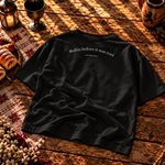 Back of the black boxy tee printed Rollin before it was cool, since 15th century in white