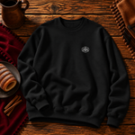 Front of the black sweatshirt with the small Chimney Cake badge on the left chest