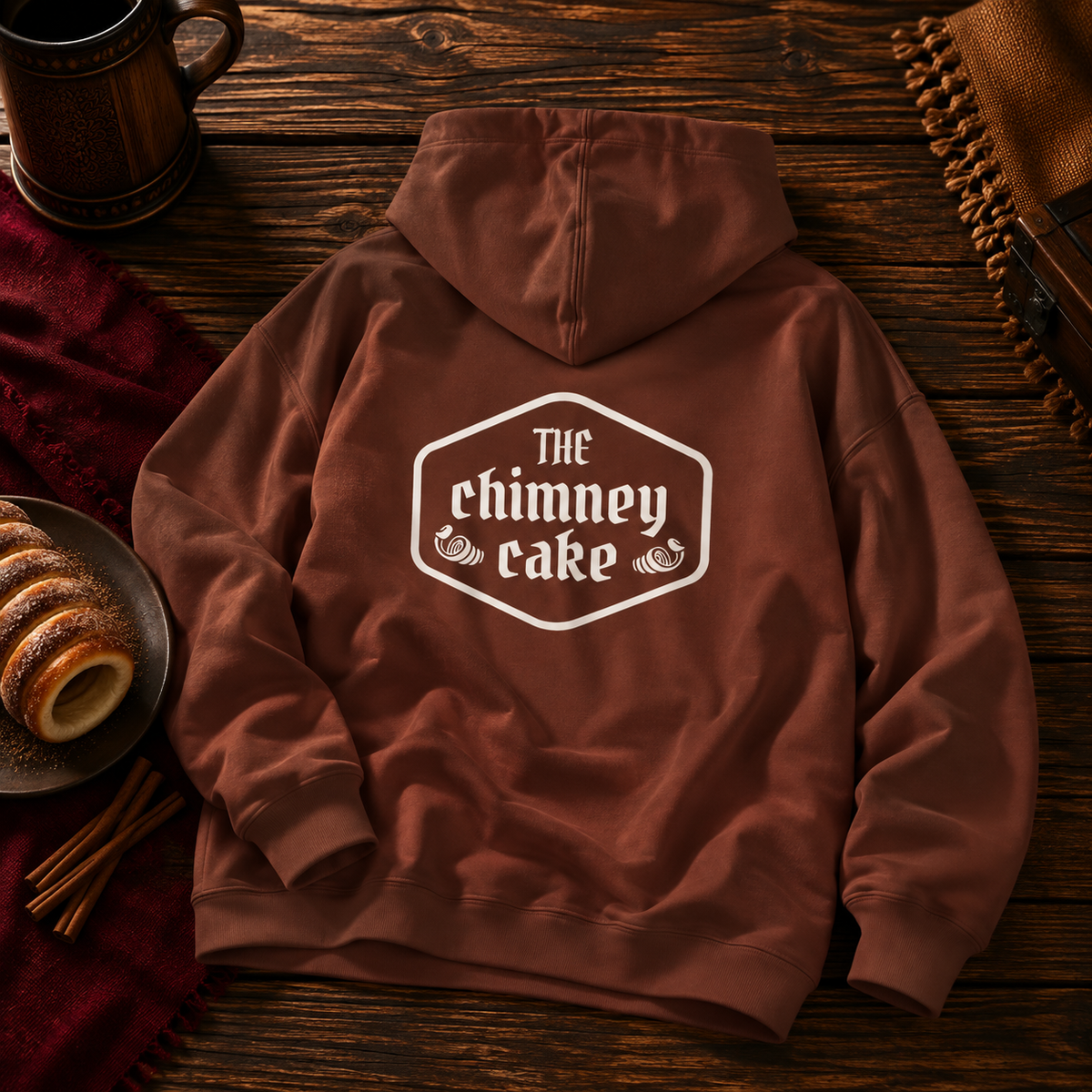 Back of the Cocoa brown hoodie with a large white Chimney Cake crest